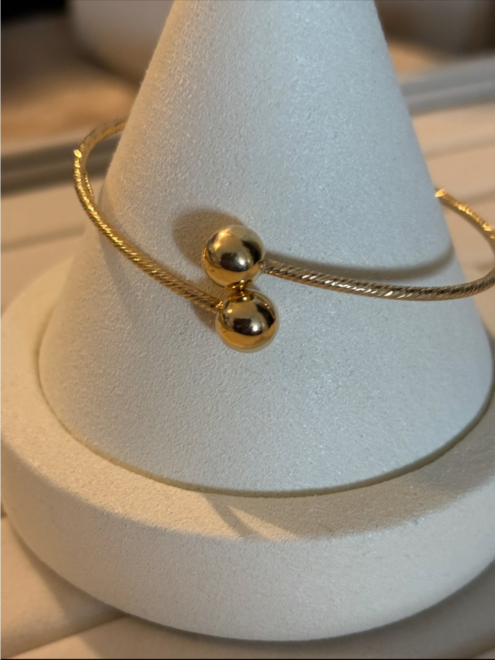 Gold-tone Open Cuff Bracelet with Double Sphere Accents